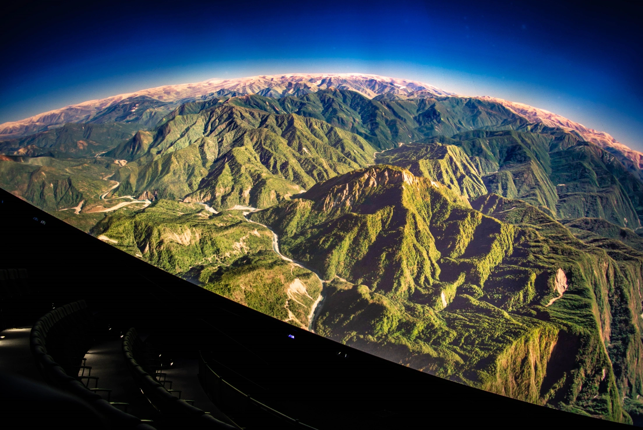 Fisheye dome projection of mountainous terrain rendered in OpenSpace